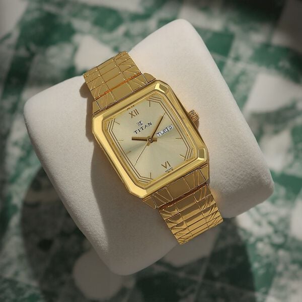 Titan Quartz Analog with Day and Date Champagne Dial Stainless Steel Strap Watch for Men